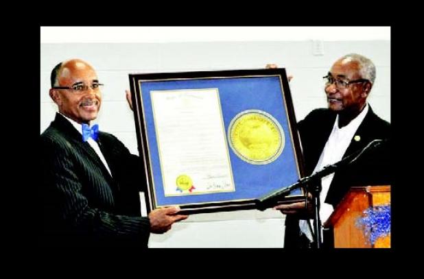 Tennessee State Representative Johnny Shaw presented Hardeman County Mayor Willie Spencer with a proclamation recognizing his service as county mayor.