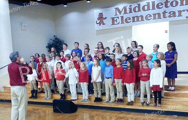 The Third and Fourth Grade students and teachers of Middleton Elementary School presented a stirring musical program to honor our veterans. Under the direction of Andrew Proctor, the students sang several patriotic songs. They honored each veteran in attendance as they sang the official hymn of each branch of military service.    