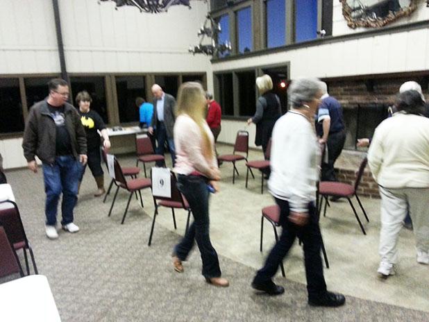 A cake walk, above, as well as a cake auction added fun and funds to the Grand Valley Women’s Club bean supper.