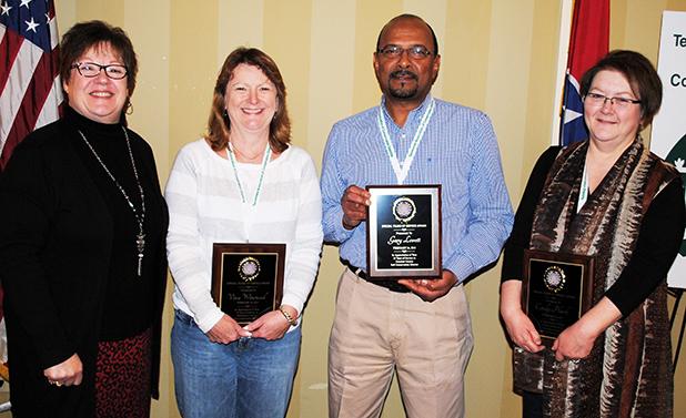 Plunk receives service award Pictured from left to right: Susan Bates (Carroll County), Vina Winstead (Williamson County), Mendel Wade (Crockett County) and Cindy Plunk (Hardeman County).