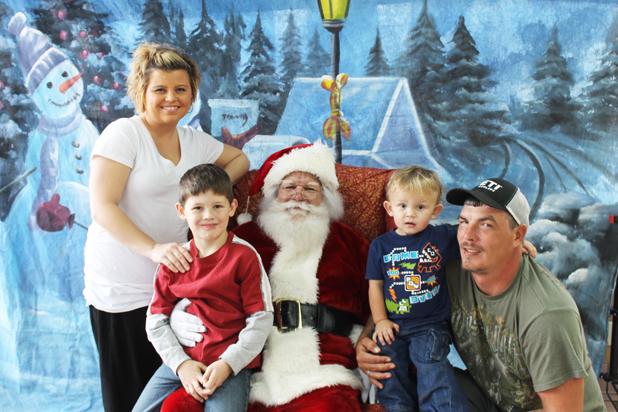Pictured (l-r) Brandy Tranum, Caleb Tranum (7 years old), Colton Mayfield (1 year old) and Kurt Mayfield. 