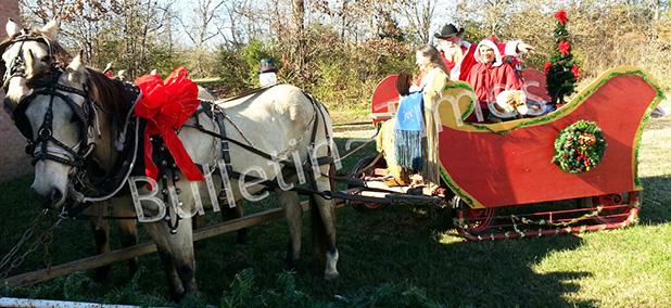 Saulsbury holds Christmas Parade Pictured above, Santa arrived at Saulsbury’s Annual Christmas Parade in a sleigh drawn by two beautiful horses. He was accompanied by Pocahontas and his faithful elf, Jan. In addition to Santa, this year’s parade was made up of fire trucks, a county rescue vehicle, numerous decorated riding lawnmowers and a huge tractor pulling a trailer loaded with children. Every participant received a commemorative ornament. The children visited Santa and there was a "most festive dressed" contest.