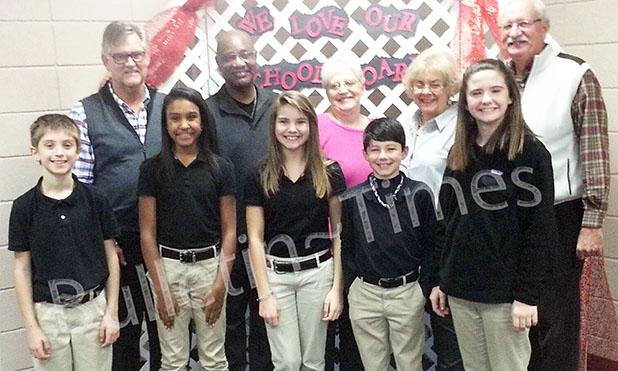 School Board members tour Middleton Elementary Students pictured (l-r) are: Connor Harris, Savana McCullough, Ella Willis, Tucker McMahan, and Emma Robinson. Back row Board Members pictured (l-r): Bobby Henderson, Jerry Crisp, Patricia Carter, Beverly Bodiford, and Buddy Nelms.