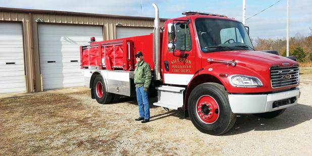 Chief John Jordan is shown standing beside the Silerton Fire Department’s new tanker truck.