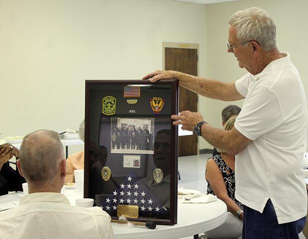 Sisco retires from Bolivar Police Bolivar Mayor Barrett Stevens presents Paul Sisco with a token of the city’s appreciation for his 31 years of service with the Bolivar Police Department.