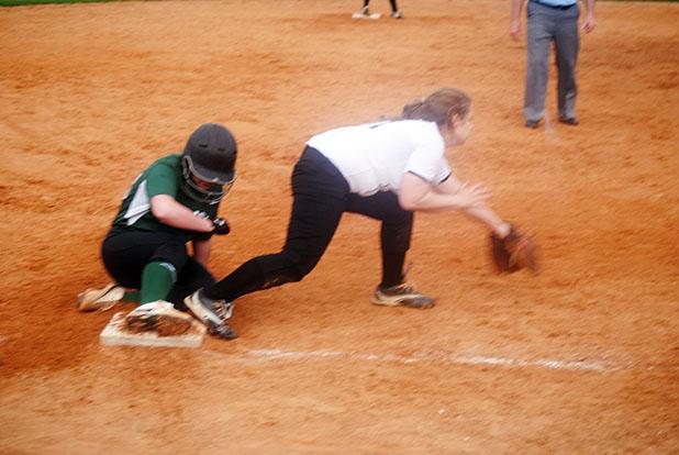 Bolivar’s Hannah Thomas slides into third just ahead of the catch by Middleton’s Abbie Phillips.  