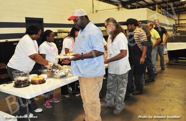 Industrial Commercial Equipment US, Inc. (ICE) employees enjoyed green beans, corn, chicken and dressing, gravy, rolls, cranberry sauce, peach cobbler and lemon and chocolate cakes served by Blanche Cox Ministry.