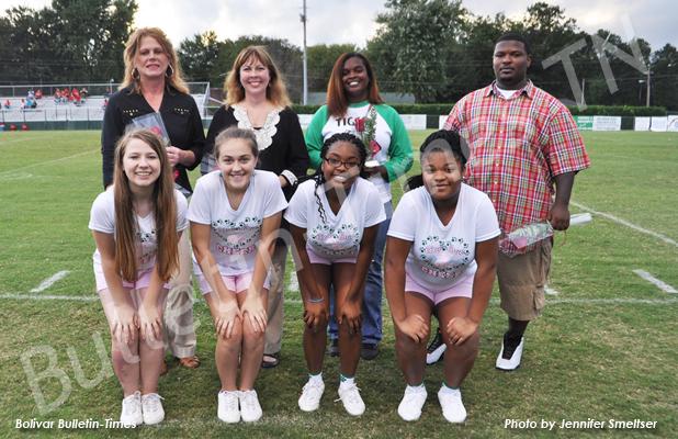 BMS recognizes the eighth grade football players and support members Pictured on the front row (l-r): Amanda Kennedy, Emma Cody, Jamaya Burkley and Kiera McNeal. On the back row (l-r): Brenda Kennedy, Dawn Cody, Tosha Reaves and Fred McNeal.
