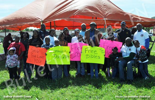 Community Day held in Whiteville Pictured front row (l-r): Chloe Williamson, Matthan Jones, Gladdaysha Wilson, Goriannah Pirtle, Tyrone Burns, Jr., Joshua Harvey, Maya Wilson, Elizabeth Burns, Leila Harvey, Morgan Wilson, Arlena Burns, Elder Emil Jenkins and Myi Pirtle. Back row (l-r): Anthony Wilson, Marla Wilson, Temisha Allen, Shunda Williamson, Drexler Allen, Robert Greer, Sharon Burns, Andrae Parham and Elder Eddie Jenkins.