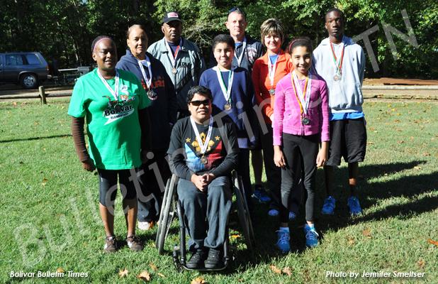 Family 5K Run/Walk Fitness Fun Day promotes health awareness Pictured (l-r): Armatha Woods, Mary Woods, James Spencer, Louie Buchud, Noah Smeltser, Billy Cossar, Sharon Cossar, Marnina Smeltser and Christian Robertson, who were winners in the 2014 Family 5K Run/Walk Fitness Fun Day.
