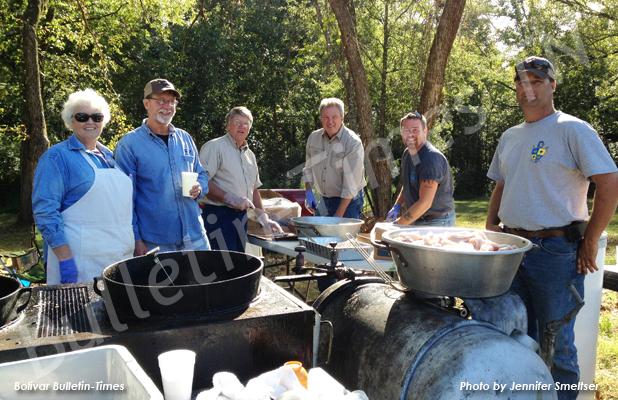 Pictured (l-r): Catfish fryers Faye Tomlinson, Billy Tomlinson, Rex Brotherton, Saulsbury Mayor Ken Daniels and Patrick Mitchell, and hush puppy fryer Clay Joiner.