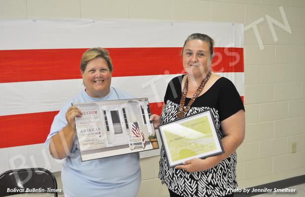 Pictured is Hardeman County Central Dispatch Supervisor Dana Knight (right) being presented with a certificate of appreciation and picture by HCLC Director Kristi Corkum.