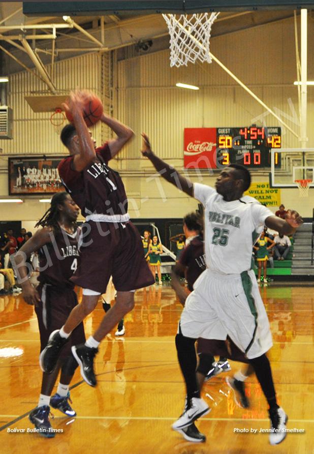 Javonte Crisp goes up for the block against Liberty Tech.