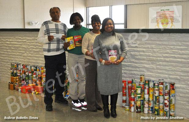 BMS Clean Club makes donation Pictured (l-r): Willie McKinnie, Clean Club secretary Porsha Cross and Clean Club co-sponsors Quintessa Stewart and Ashanti Joy.