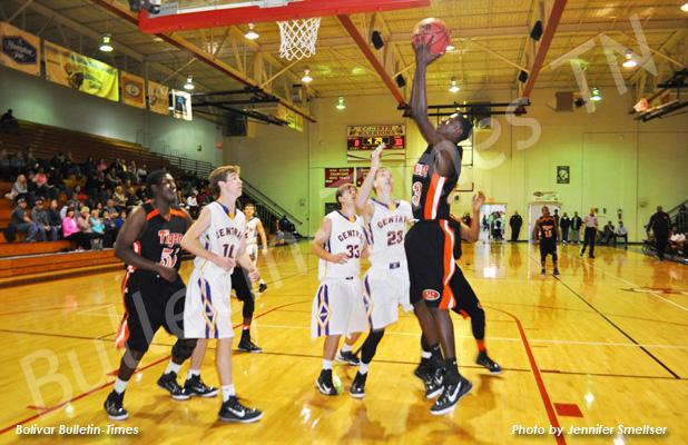 MHS Tiger Latavvis Golden goes up for the shot against Alcorn Central at the Lighthouse Thanksgiving Classic.