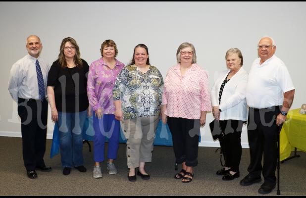 Photo left to right: Randy Bishop, Cynthia Scott, Maggie Barrowclough, April Simpson, Wanza Taylor, Annette Cornelius, and Carl Gibson of the Middleton Community Libary Board. 