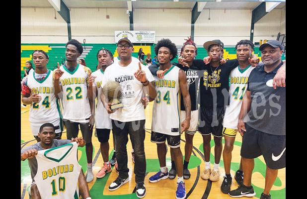 Photo left to right: Jamarion Pirtle, Christian Clark, Tovarus Woods, Coach Devon Lake, Jeff Norment, Jaquan Lax, Trey Henderson, Toris Woods, Coach Dennis Bills. In front: D.J. Smith. Not pictured: Isaiah Perry and Brandon Neely.