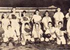 Pictured, front row (l-r): Coach Charlie Coddle, Joe LaCroix, Don Rowland, Barret Stevens, Buddy Sasser,  J.T. Sipes and David Meadors. Back row (l-r): Coach Coddle’s son, Thomas Morris, Jimmy Boyd, George Brint, Rainey, Bill McDaniel and Howard Baker.