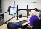Jeff Rogers of Intrado, a data company that is setting up aspects of the new 911 system at the location on Jackson Street in Bolivar that will house 911 beginning August 11. Technicians from AT&T were also working on the system.