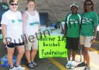Players on the the 9-10 year old All Stars and their parents held a bake sale on Saturday, June 20, at the Bolivar Wal Mart. Photo (l-r) Sarah Rice, Brittney Clark, Trey Turner, Octavia Patterson.