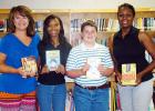 Bolivar Middle School was one of only three schools in Tennessee and the only school in West Tennessee to receive the James Patterson grant to purchase books for students. Pictured (l-r) BMS Librarian Deana Sain, Anessa Sain, Sam Baker, and Principal Mary Ann Polk