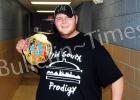 Bam Bam Bundy, better known as Grant Hatton to his friends in Bolivar shows off his Ripley (TN) All Pro Wrestling championship belt.	