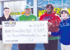 Dameon Nowelin, Managing Partner at Bolivar Ford, Bolivar Central Head Football Coach Woodrow Lowe, and Bolivar Central players Jaylan Beard and Matt Jackson. 