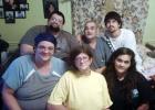 The Henrys pose for a family portrait one week before the father’s death from cancer. Front (l-r) daughter Tiffany Rustin, mother, Glenda, and daughter Robin Pittman. Rear,(l-r) son James, Jr., father, James Henry, and son Robert. The family provided around-the- clock care for their father as he progressed through his terminal illness. “We were emotionally and physically exhausted”, said Rustin. 