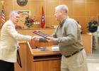 Former Hardeman County General Sessions and Juvenile Court Judge Charles “Chip” Cary was presented with a plaque of appreciation and many other gifts during his retirement party on Friday, September 19. Pictured is Hardeman County Mayor Jimmy Sain presenting Cary with a plague in appreciation of his service to the county.