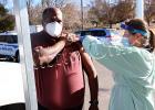 Bolivar Police Chief Mike Jones gets the Moderna COVID-19 vaccine at the Hardeman County Health Department from Melissa Anderson.