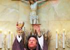 The faces of Christianity: Part 1 Rev. Fr. W.H. Arnold of St. Mary Catholic Church in Bolivar, pictured during Sunday Mass.