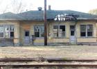 The Grand Junction railroad depot is shown as it appeared one month ago. Approximately one third of the roof had rotted and fallen through. The floor beneath this hole had rotted away as well. The Grand Junction Depot Museum Corporation, under the leadership of Kathy Ledbetter, has raised enough money to begin restoration and a contract has been awarded for completion of  phase one.