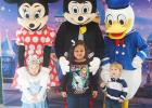 Mickey’s Magical Meal a success Laynee JoAnna (daughter of Cassie Holmes), Mya Overton (daughter of Lindsey Overton), and Maddox Morein (son of Kim and David Morein) pose for a picture with Minnie Mouse, Mickey Mouse and Donald Duck.