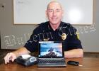 Bolivar Police Chief Pat Baker with the new E-ticket computer system. The machine on the left prints your ticket, while the computer  serves as a functional take away tablet that an offender also uses to sign their ticket, with the smaller box has portable wi-fi capabilities for any need that may arise.