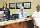 Elaine Woods was the first to vote on May 1. She is joined by (left to right) Hardeman County Administrator of Elections Amber Moore, and election staffers Amy Cleek and Barbara Grant.