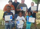 Winners of the 2015 Inman E. Pettigrew Fishing Rodeo pictured front  row (l-r) Montarious Douglas, Lion Collin, Aubrey Robertson. Back row (l-r) Devin McBroom, Hardeman County Mayor Jimmy Sain, Caleb Atkins, Alan Thompson.