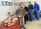 Guests pictured (l-r): Cade Goodwin, Lila Davison, Pat Plunk, Curtis Vandiver, and Terry Parchman prepare to sample some of the hors-d’oeuvres served at the City of Hornsby’s open house on Dec. 19. Pat Plunk and Patricia Parchman put together the assortment of fruits, veggies, cheeses, dips, and sweets. 
