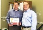In celebrating National Small Business Week (April 29-May 5, 2018) Joel Newman (right) of the Tennessee Small Business Development Center gave an award to Greg Byers of Unity Health and Wellness Clinic in Bolivar for Outstanding Health Services.