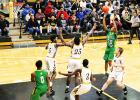 Juquan Lax was among four Tigers in double figures on January 22 against Millington. Lax had 11, D.J. Smith had 12, and Tovarious Woods had 12. Antavious Shaw led Bolivar with 14 points and 11 rebounds. Photo by Ginger Tester. 