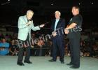 Lance Russell (left) is honored by his former partner Dave Brown and Jerry “the King” Lawler in the ring during last Saturday night’s USWA wrestling event in his honor.