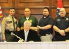 Pictured front, Hardeman County Mayor Jimmy Sain. Back row (l-r) Middleton Police Chief Lynn Webb, Tennessee State Highway Patrol Sgt. Don Velez, Hardeman County Sheriff John Doolen, Hornsby Police Chief Shane Swift, Toone Police Chief Jerry Siler and Bolivar Police Chief Pat Baker.