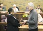 Bolivar City Mayor Barrett Stevens (right) presents DCS employee Lou Fields with a proclamation of appreciation for her work in helping abused and neglected children.