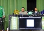 Mays (left), and Lowe (right), with Bolivar Central Head Coach Woodrow Lowe, were honored in a ceremony, which included them receiving their high school diplomas on December 11. Both signed the official paperwork at home. 