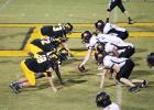 Middleton’s defense struggled to stop Peabody’s running game as they rushed for 301 yards against the Tigers. Photo by Laura Lowe Criswell 