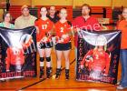 Middleton Seniors and their parents: (l-r) Dennis Woods, Felicia Woods, Christian Woods, coach Zeke Craft, Jazmine Cosby, Lawrence Cosby, Misty Cosby.