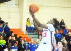 Latavvis Golden goes up for two points during Middleton’s game against Riverside.