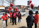 Members of the Minter family release balloons during the Stop the Violence Rally.