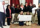 Modern Woodmen Matching Fund check presented to Middleton High School HOSA class.  Pictured, back row (l-r): Ronny Clift, Modern Woodmen Representative,  Carla Doyle, HOSA class leader, Kaitlyn Smith, Shemeka Sain, Kristina Flores, Jake Hall, Austin Roberts and Trekeldra Stinson. Front row, (l-r):  Morgan Mills and Jessie Willis.