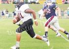 Montrez Jones returning an  interception for a touchdown in the first half. by Cristie Maness. 