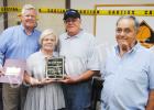 Hardeman County Mayor Jimmy Sain, Geraldine Nuckolls, Sammy Nuckolls, Hardeman County Highway Department Superintendent David Sipes are pictured after Nuckolls was recognized for 30 years of service.